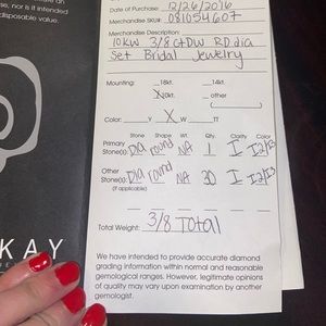 Wedding ring and band from Kay jewelers.